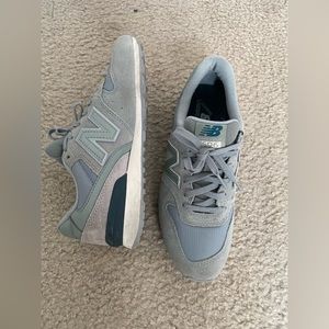 Neutral-Tone New Balance sneakers.